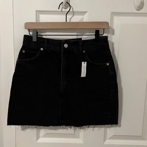 Black denim mini skirt